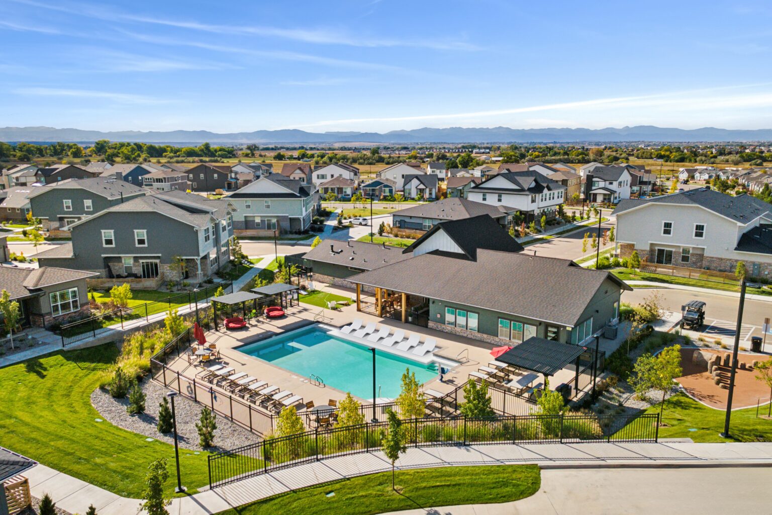 aerial drone shot of pool and homes